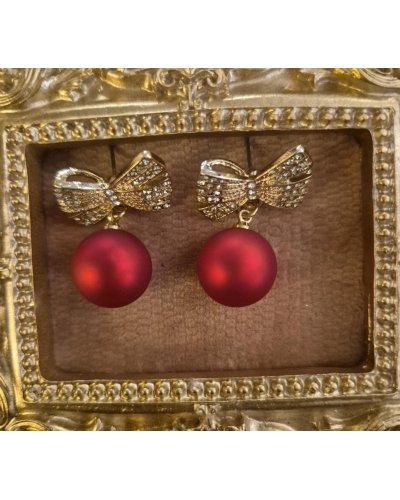 Boucles d'oreilles boule rouge et noeud strass