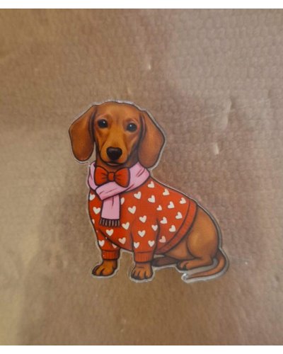 Pin's Teckel écharpe rose